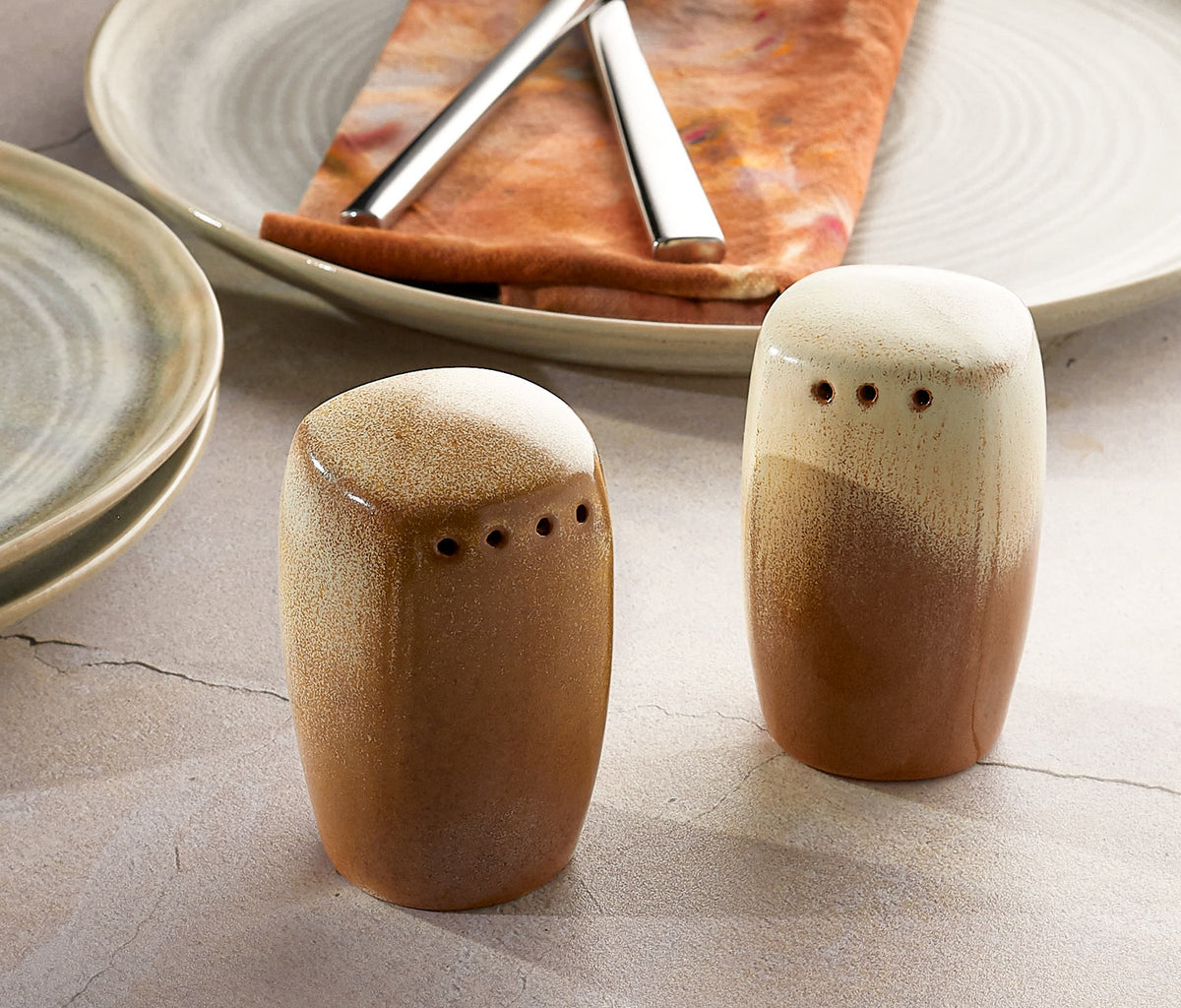 http://lollygag.co/cdn/shop/files/Frankoma-Plainsman-Desert-Gold-Salt-_-Pepper-Shakers-Lollygag_1200x1200.jpg?v=1692159667