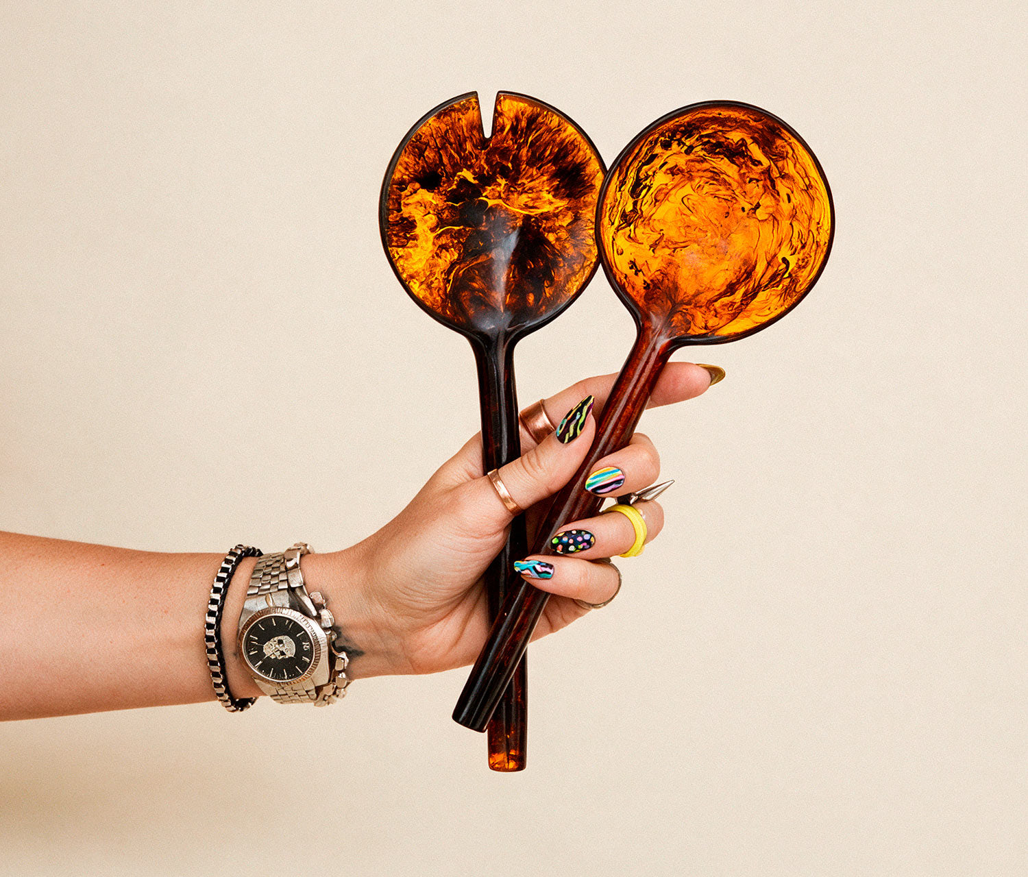 The Gigi tortoise resin salad servers, hand-poured amber and brown swirl