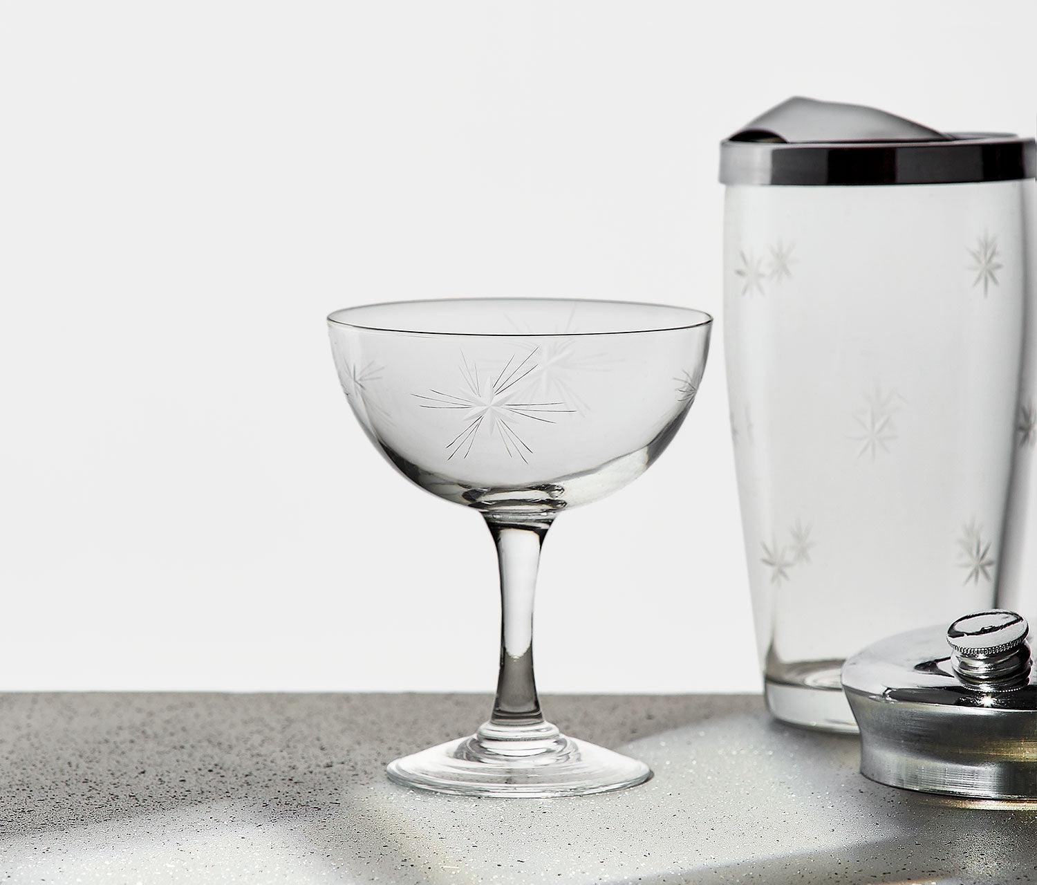 https://lollygag.co/cdn/shop/products/Vintage-Mid-Century-Atomic-Starburst-Shakers-Glass-Bar-Set-glass-lollygag.jpg?v=1661447039